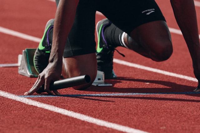 Athletes sprinting on a track